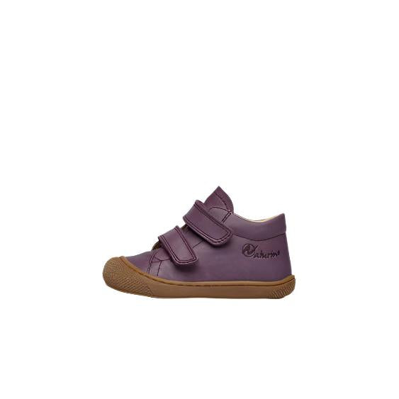 Purple children's shoe with velcro straps on a white background