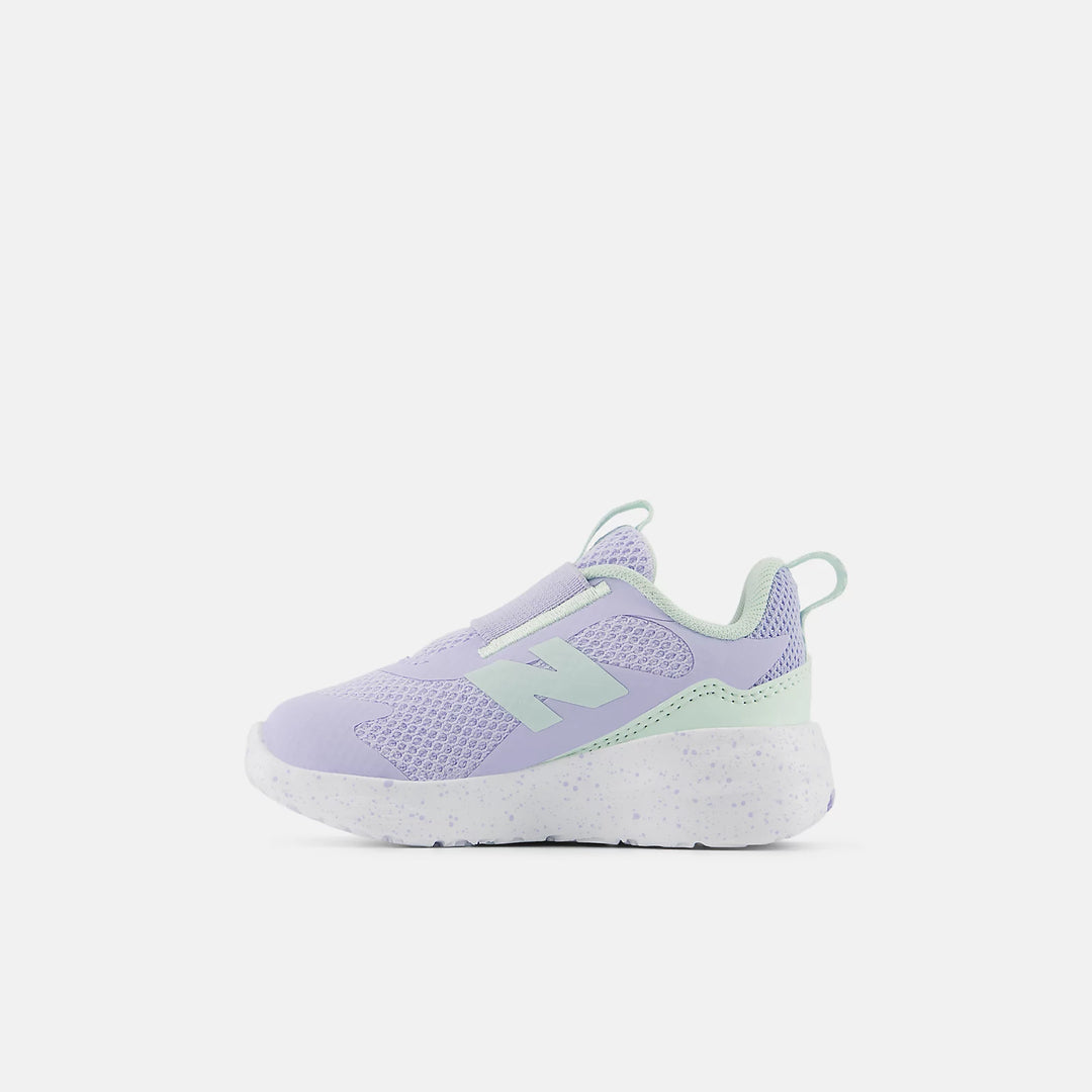 Purple and light green sneaker on a white background