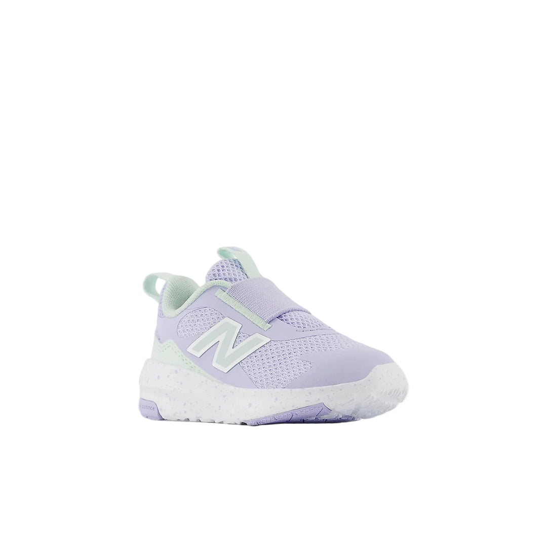 Purple sneaker with white sole on a light gray background
