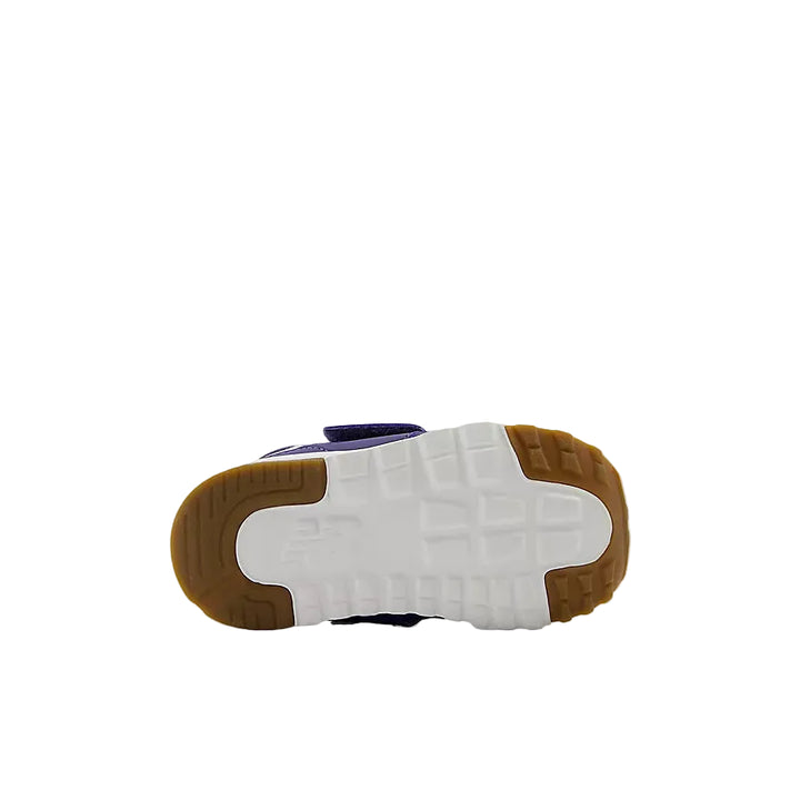 Sole of a sneaker with white sole, brown heel, and purple side on a white background