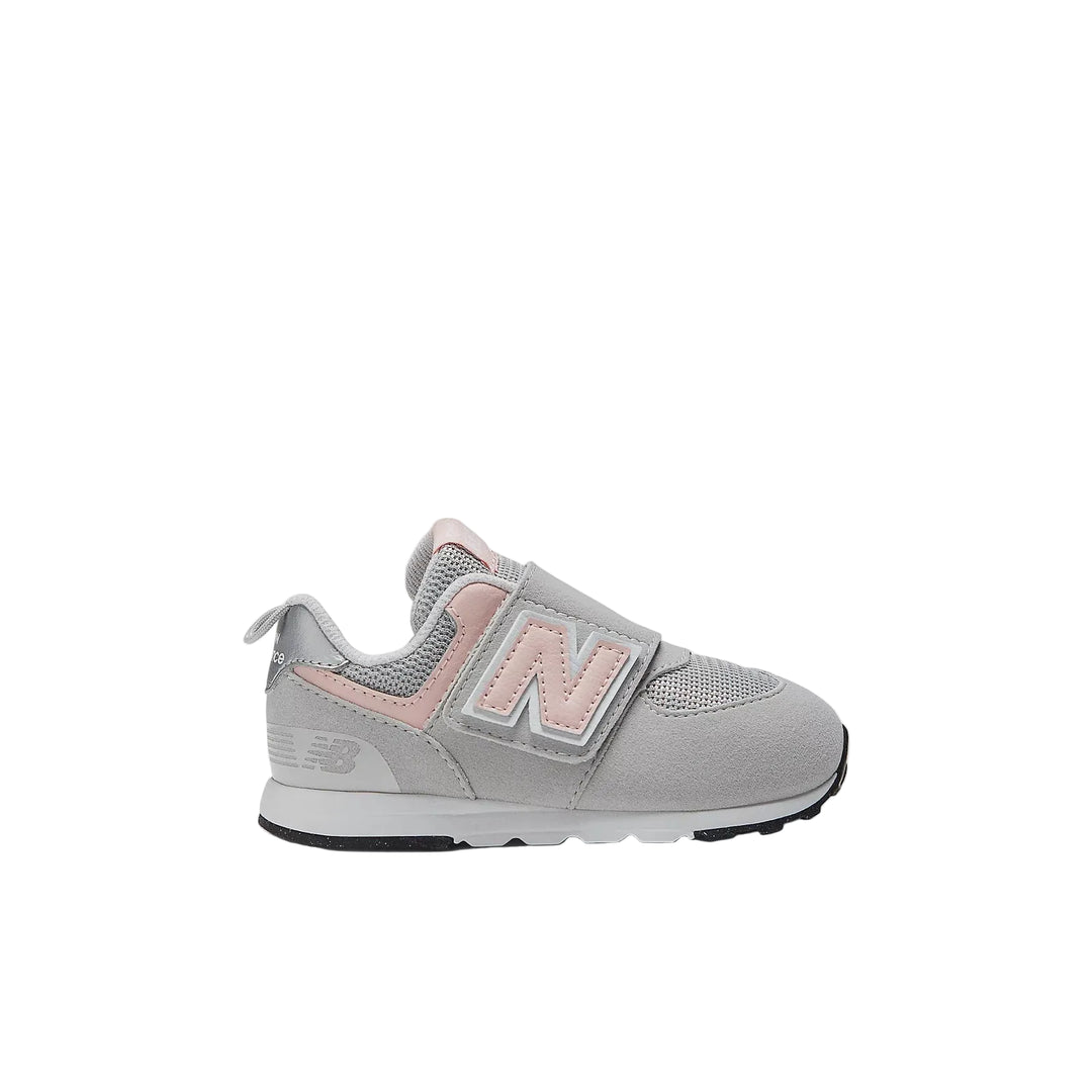 Gray and pink New Balance sneaker on a white background