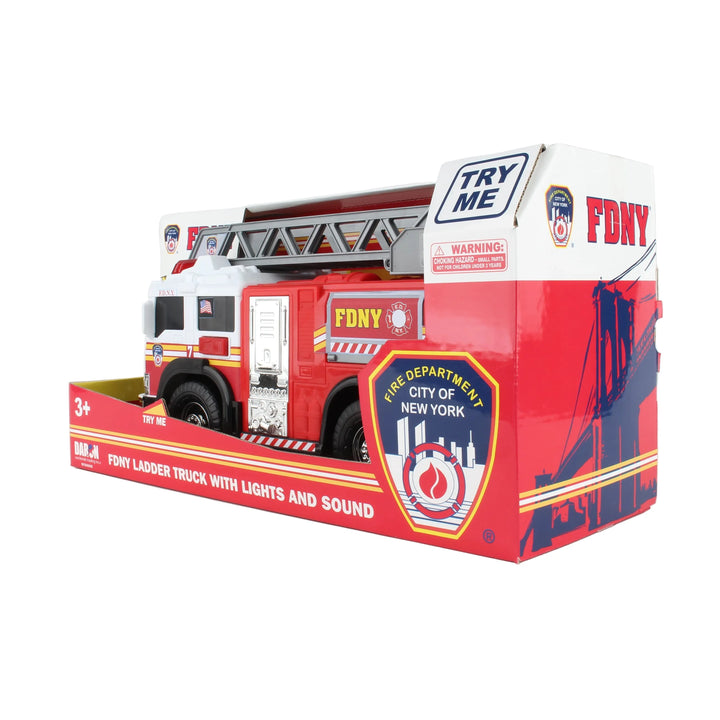 Toy fire truck with lights and sound in packaging featuring FDNY branding.