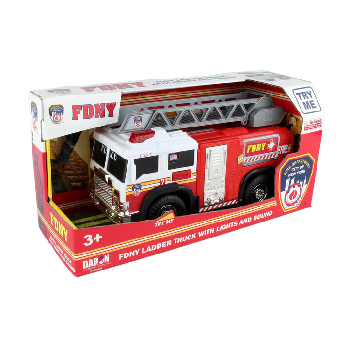 Toy FDNY ladder truck in packaging on a white background