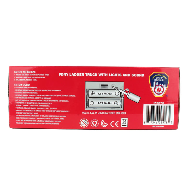 Red box packaging for a toy FDNY ladder truck with battery information on a white background