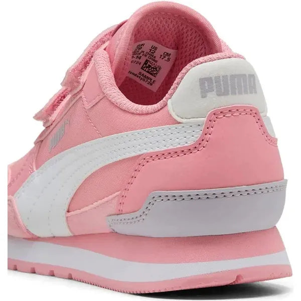 Pink and white Puma sneaker on a white background