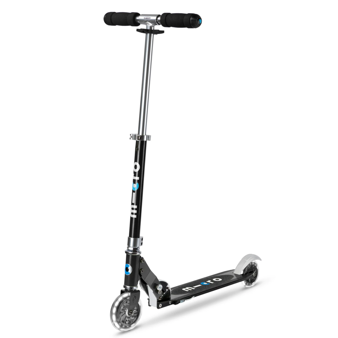 A blue Micro Sprite LED scooter with LED light-up wheels, designed for children.