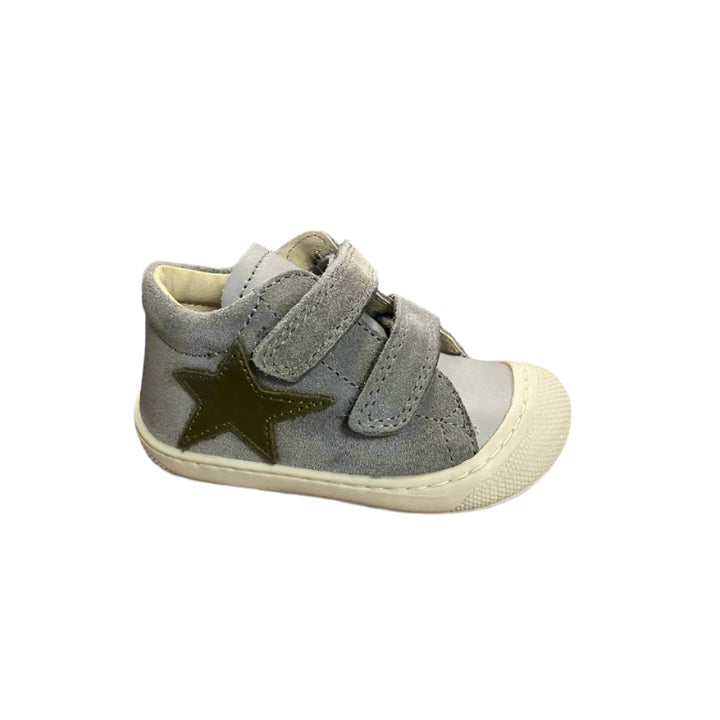 A pink toddler shoe with a star patch on the side, featuring a hook and loop closure.