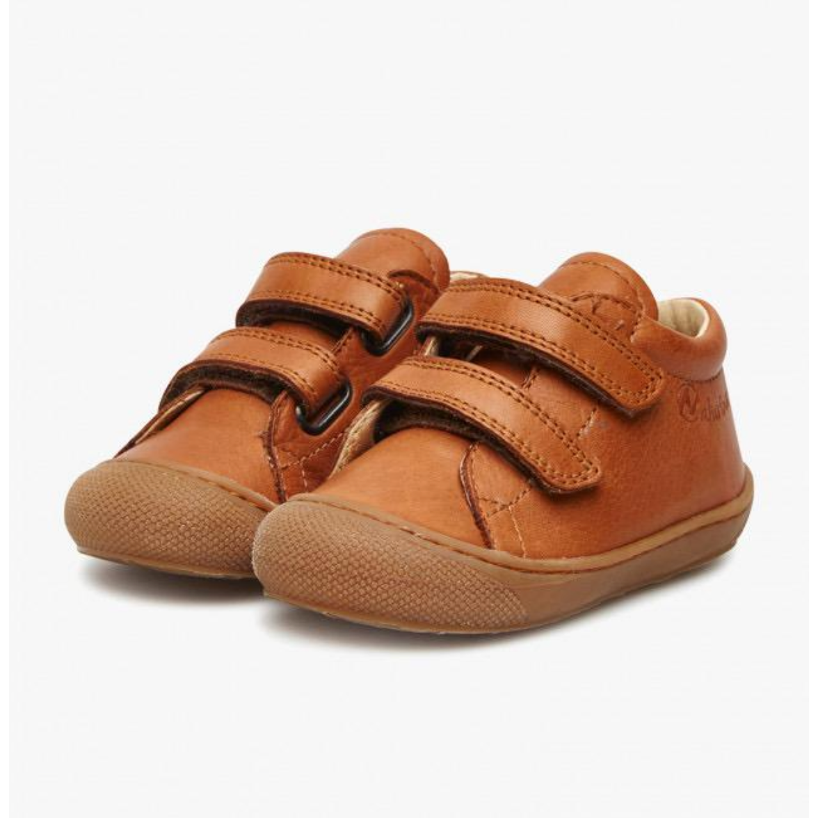 A pair of brown toddler shoes with double Velcro straps and light cognac brushed Nappa leather uppers.