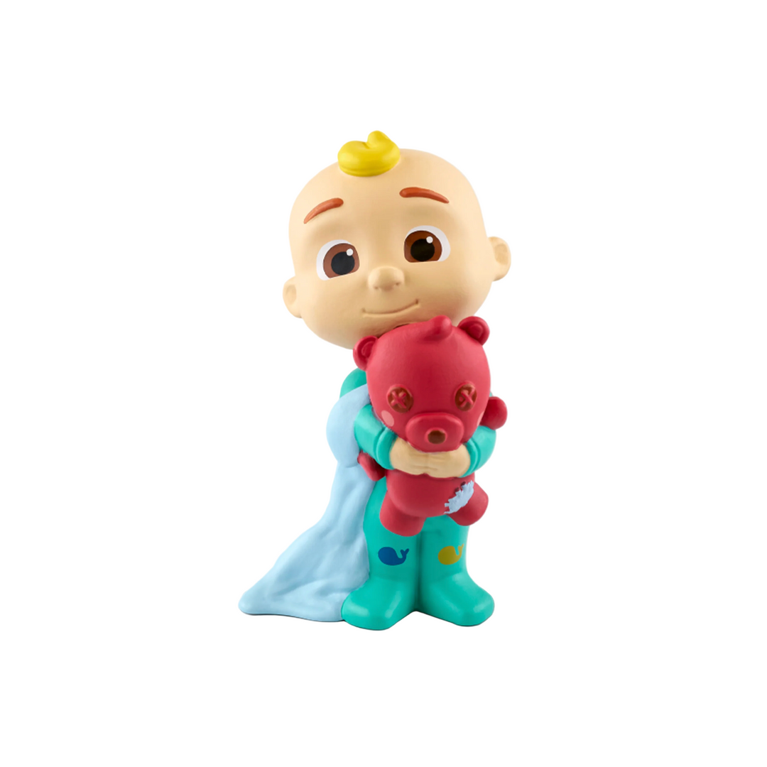 A figurine of a cartoon character holding a red plush toy, with a blue and green outfit, yellow hair, and a smile on its face.